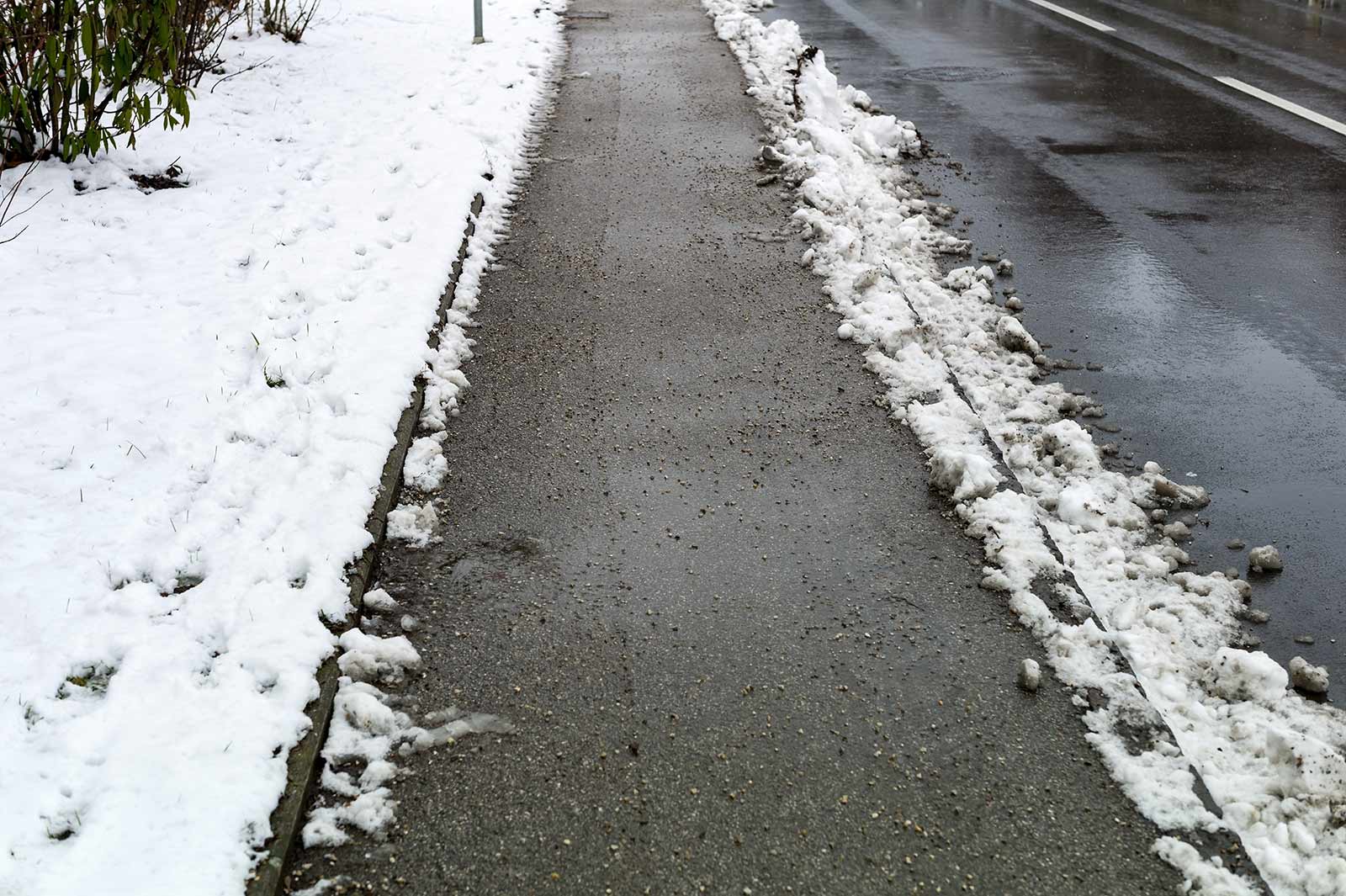 Befreiung von Schnee für Gehwege mit Winterdienst